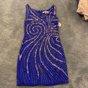 Blue dress w sequins.